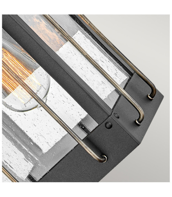 Hinkley outdoor wall light Aluminum, brass, clear seeded glass Textured black with burnished bronze