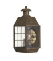 Hinkley outdoor wall light Solid brass, transparent seeded glass Aged brass